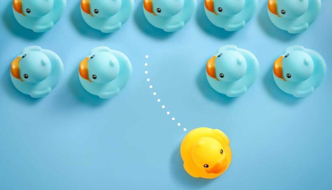 group-blue-toy-ducks-floating-one-direction-one-yellow-toy-duck-floating-different-way-blue_1200