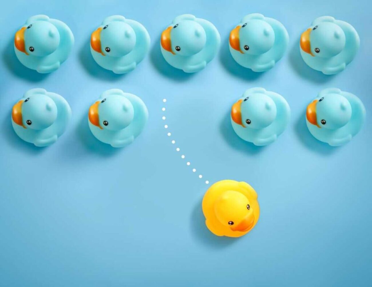 group-blue-toy-ducks-floating-one-direction-one-yellow-toy-duck-floating-different-way-blue_1200