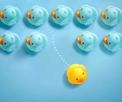 group-blue-toy-ducks-floating-one-direction-one-yellow-toy-duck-floating-different-way-blue_1200