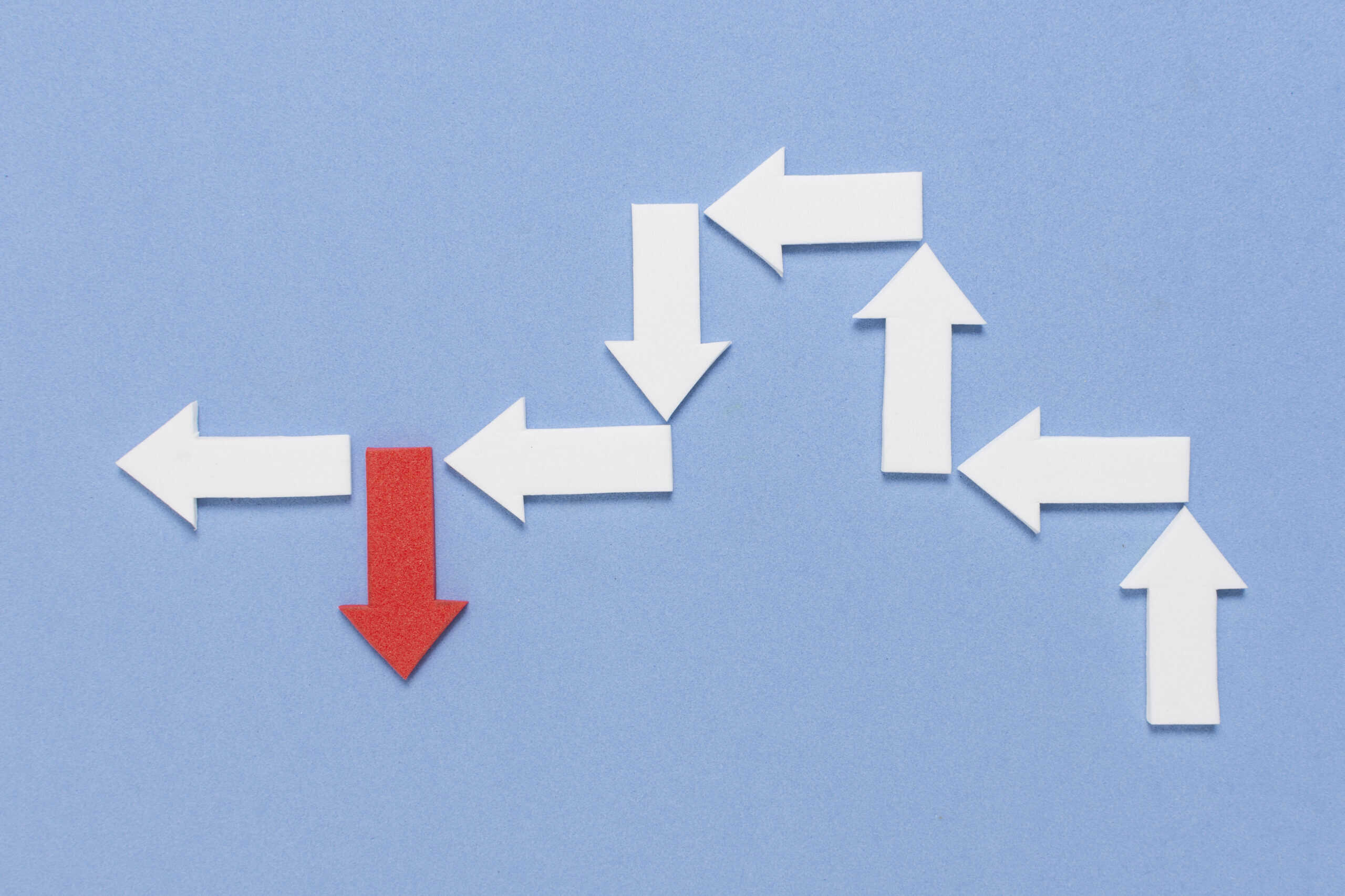 rebel-red-arrow-crowd-white-arrows-outside-line