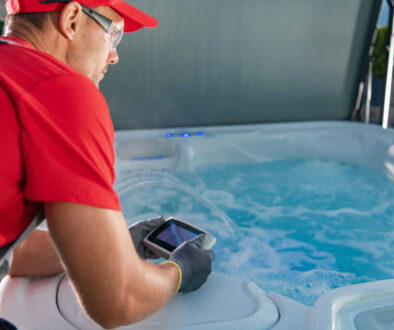 Garden SPA Technician Testing Hot Tub Remote