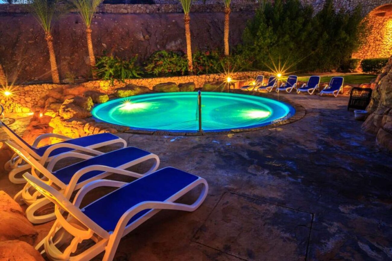 evening-view-luxury-swimming-pool-night-illumination_0x800