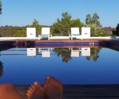 low-section-woman-resting-poolside_0x800