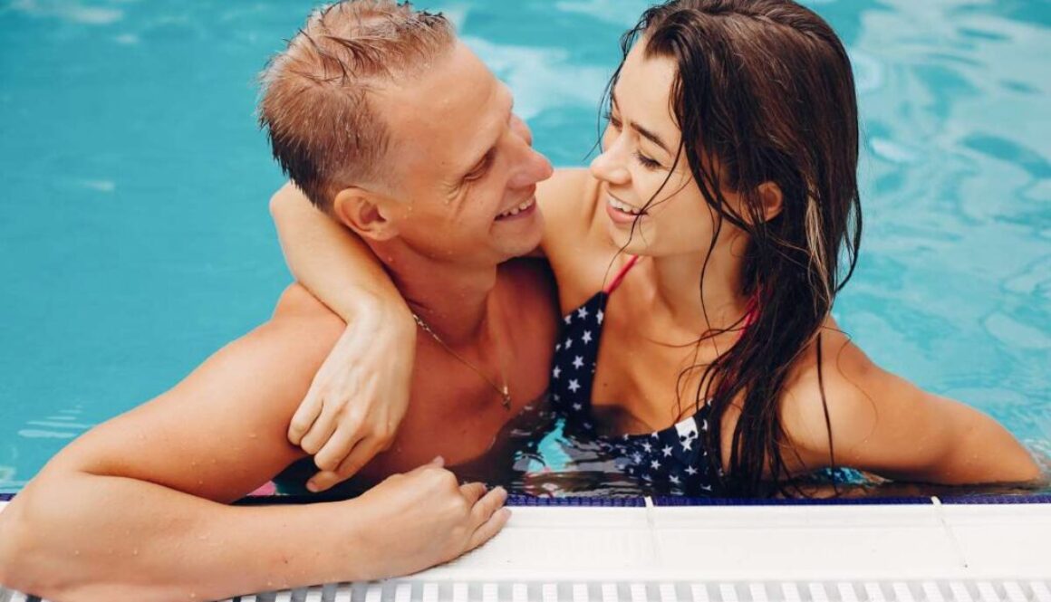 elegant-couple-swim-pool (1)_0x800