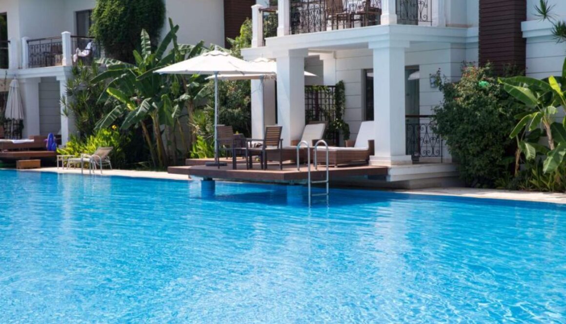 swimming-pool-summer-vacation-poolside-swimming-pool-resort-hotel-vacation-leisure_0x800